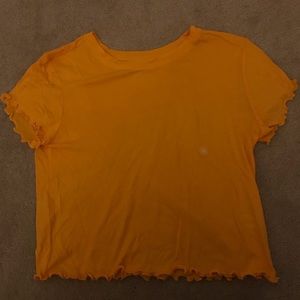 Yellow ruffled tee
